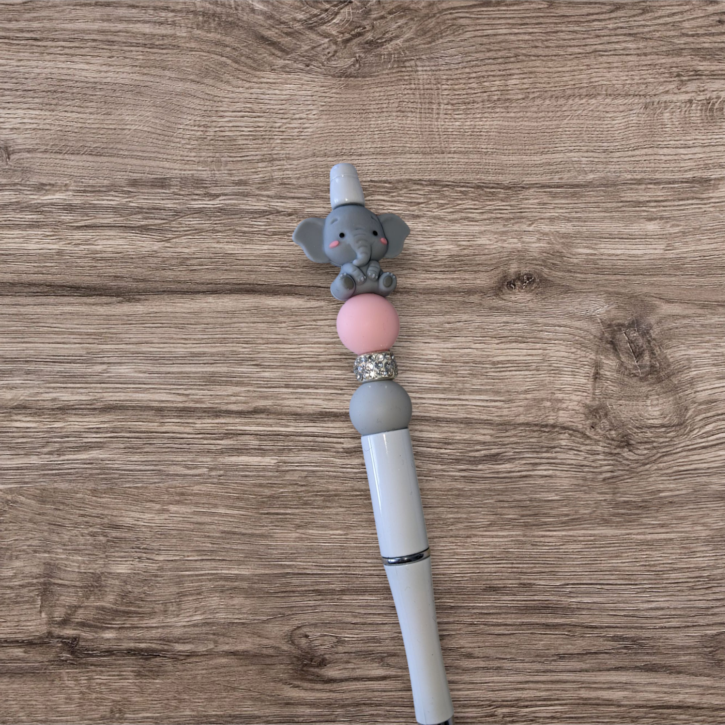 blank notebook and pen (elephant)