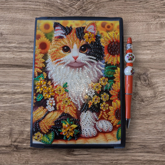 blank notebook with pen (cat)