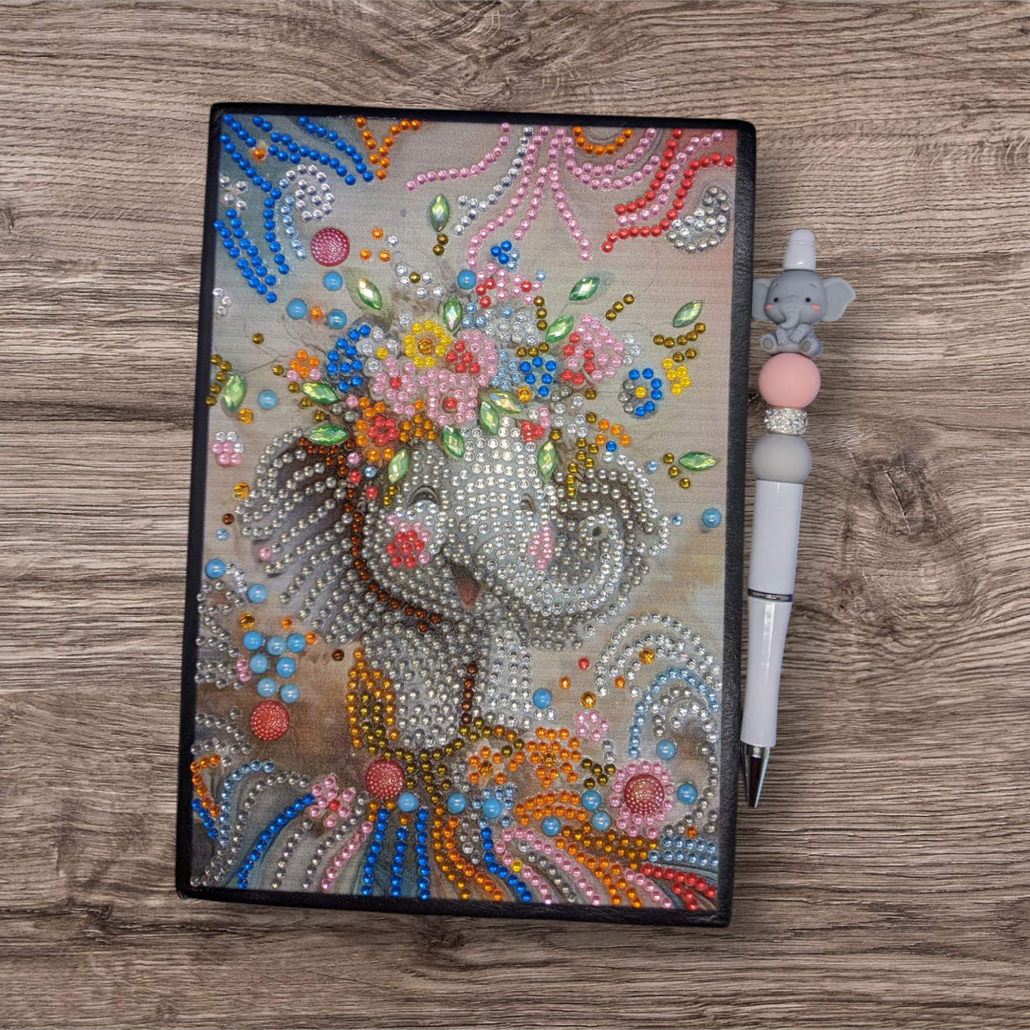 blank notebook and pen (elephant)