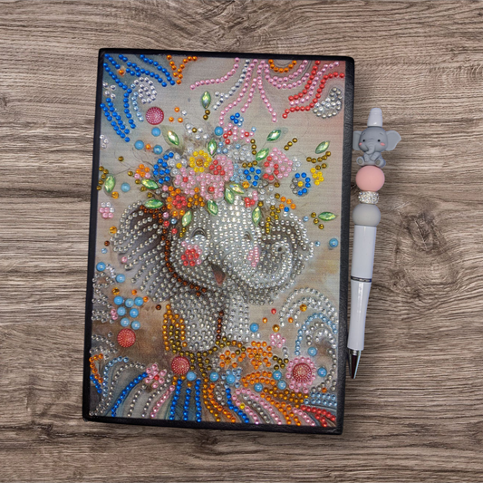blank notebook and pen (elephant)