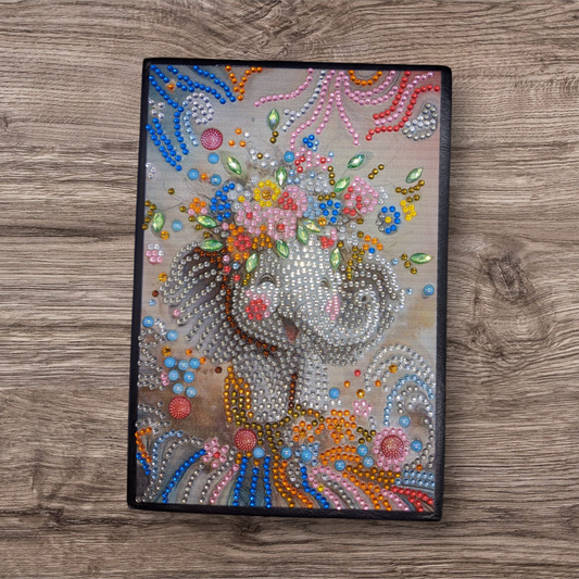 blank notebook and pen (elephant)